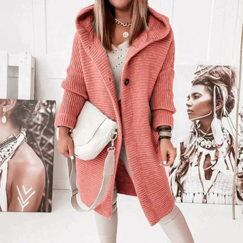Coral-red long cardigan with buttons at the upper front.