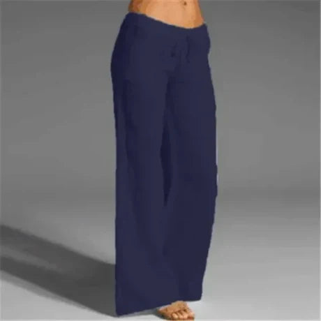Navy blue full-length trousers with a drawstring waist.