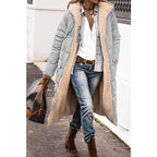 Grey long coat with a cream teddy lining.