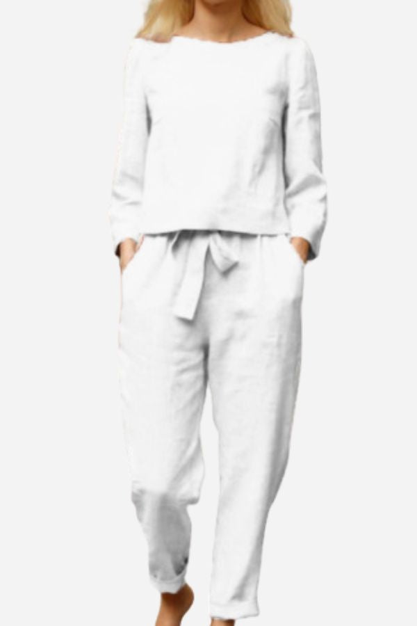 White two-piece set with a gathered waist and front tie.
