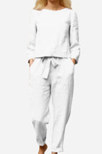 White two-piece set with a gathered waist and front tie.