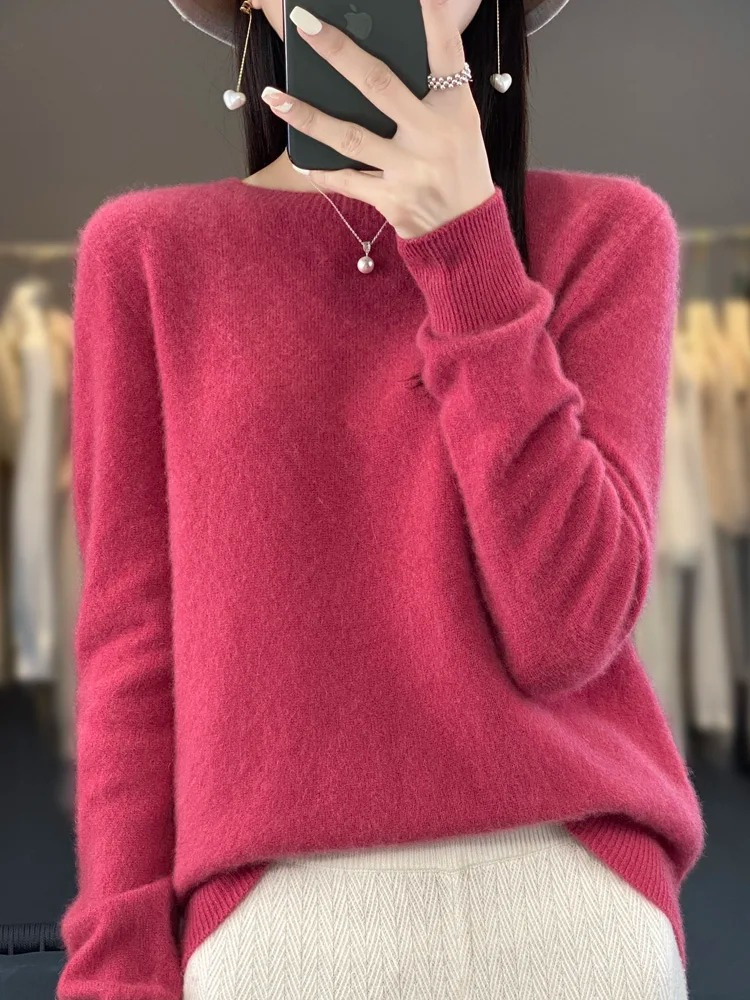 Pink-red jumper shown from the front with long sleeves.
