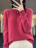 Pink-red jumper shown from the front with long sleeves.