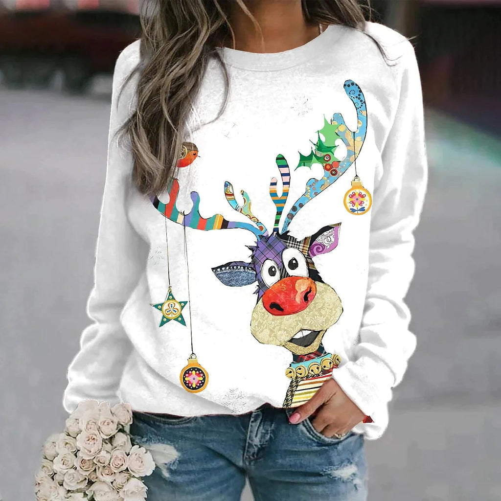 White Christmas jumper with a colourful reindeer print.