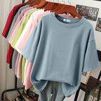 Muted blue T-shirt with a round neck and short sleeves.