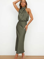 Army green sleeveless dress with a draped neckline.