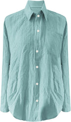 Pale blue long-sleeve blouse with white front buttons.