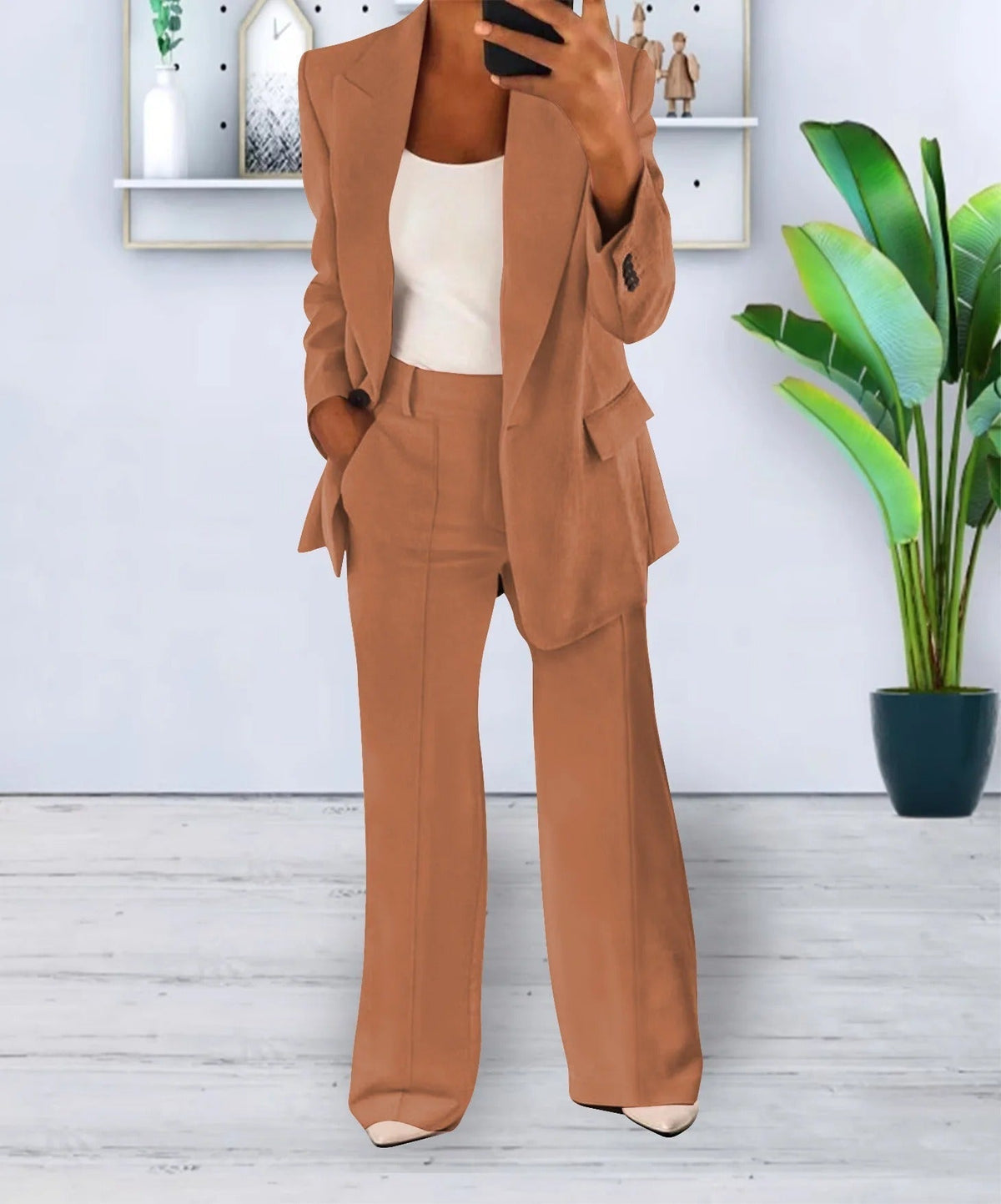 Brown lapel jacket and matching full-length trousers, shown on a model.