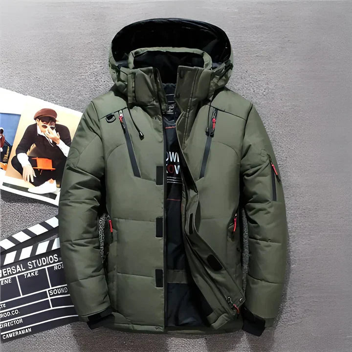 Green padded jacket with a high collar and hood.