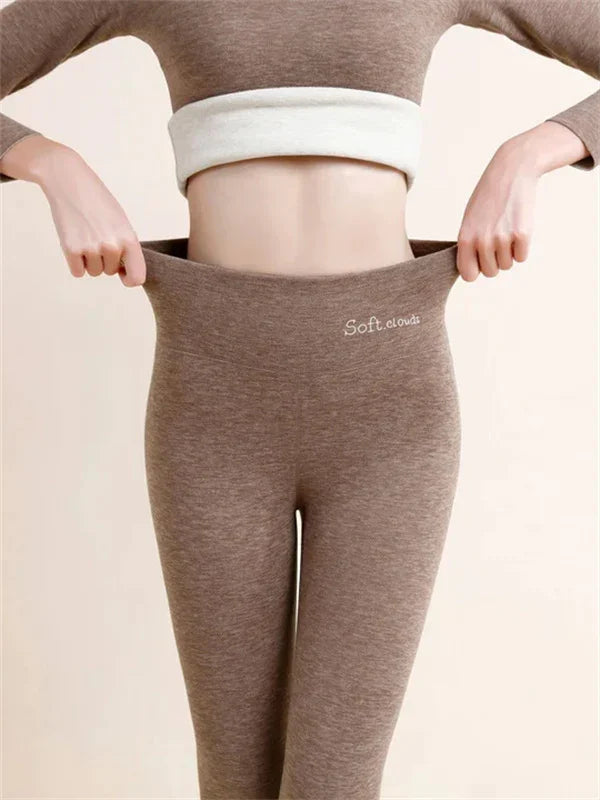 Brown high-waist leggings with the waistband held outward.
