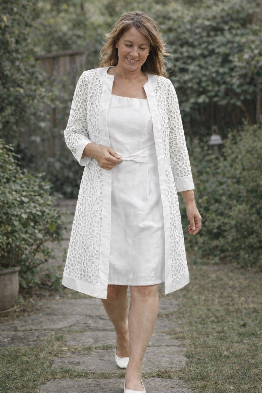 White dress and matching open-front jacket.