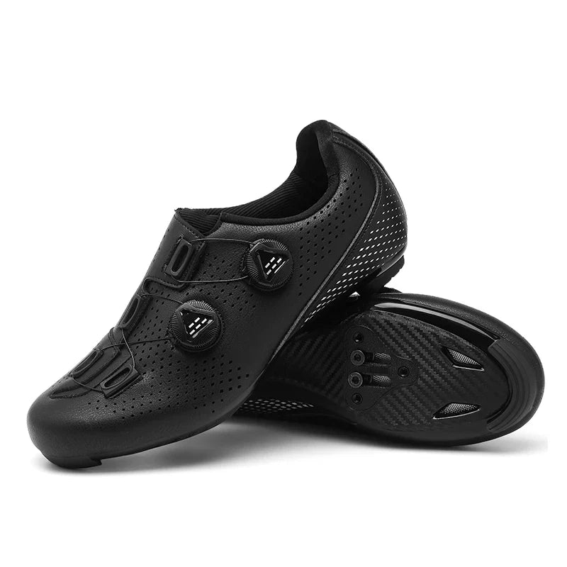 Black cycling shoes with sole mounting openings visible.