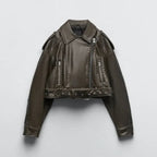 Green biker jacket fastened at the front, with vertical zip pockets.