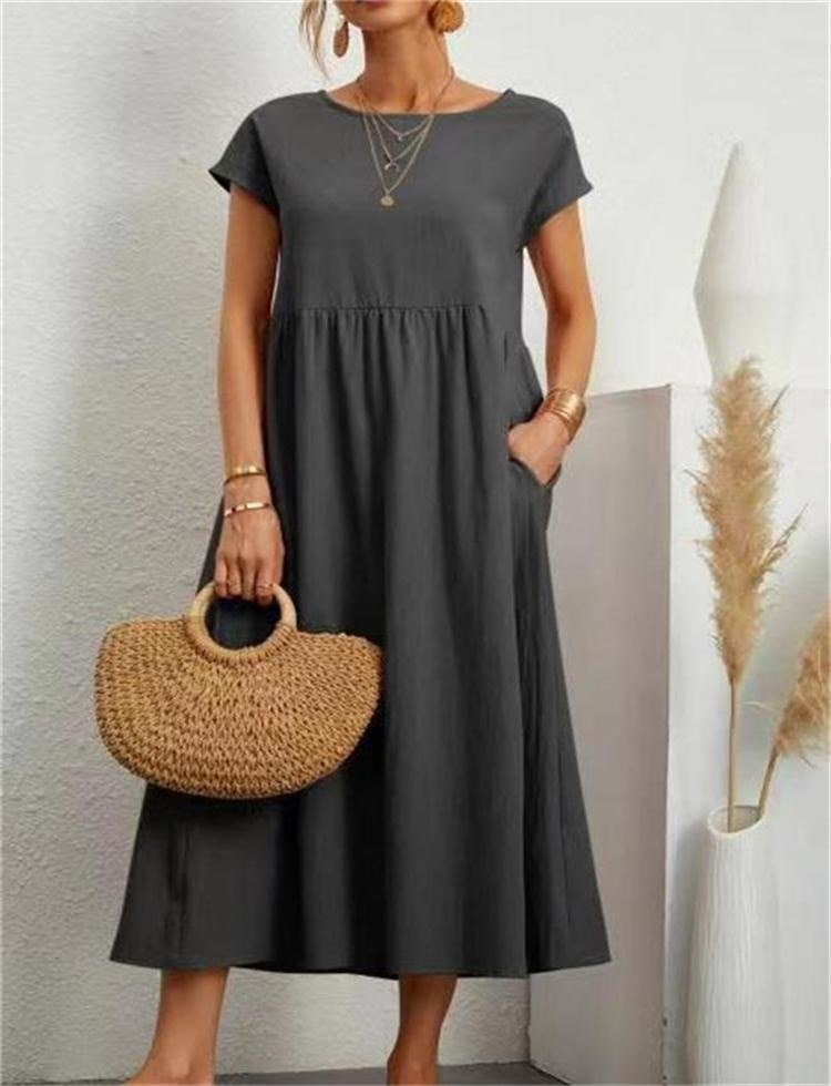 Dark grey Ginovu dress with short sleeves and a gathered waist.