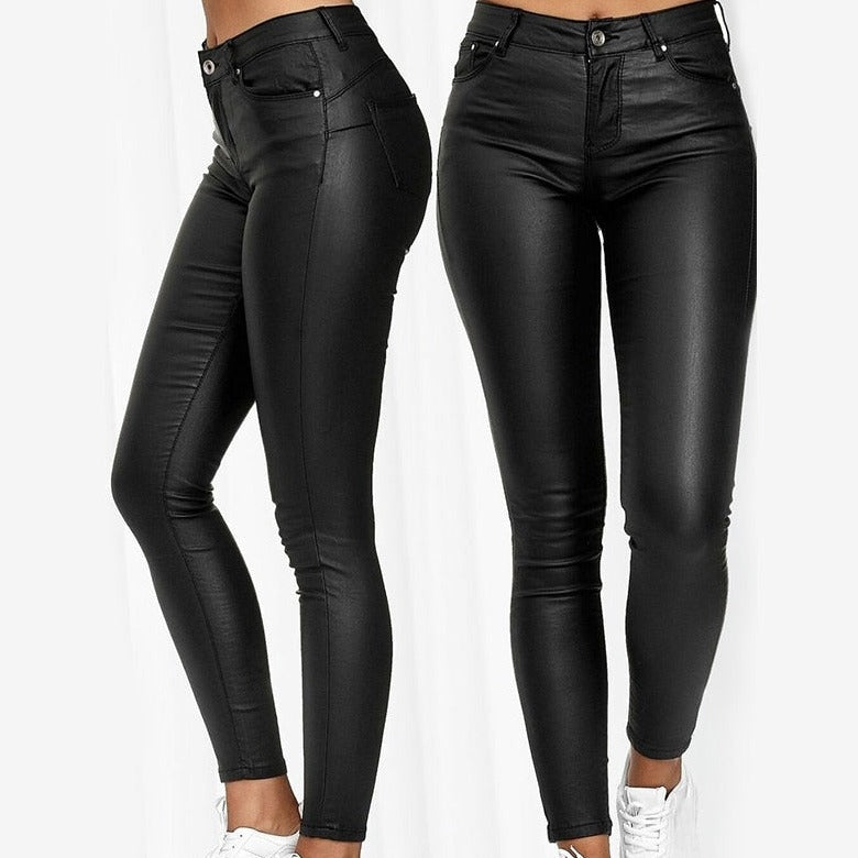 Black skinny jeggings shown from the front and side with a button waist.