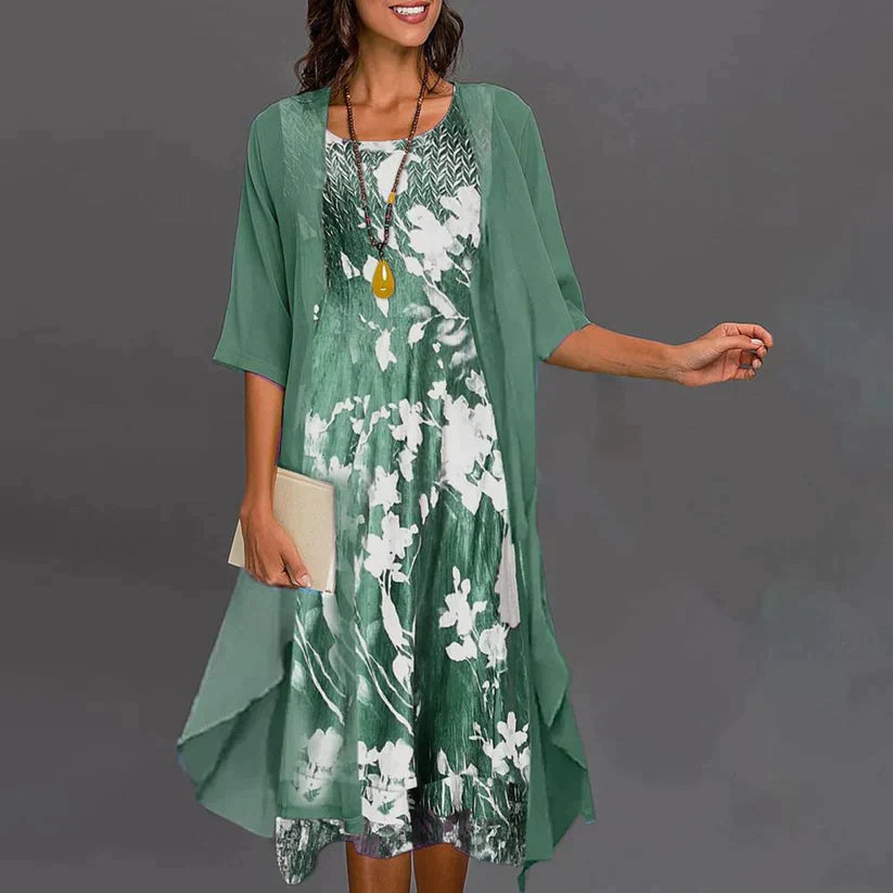 Green floral dress set worn with an open outer layer.