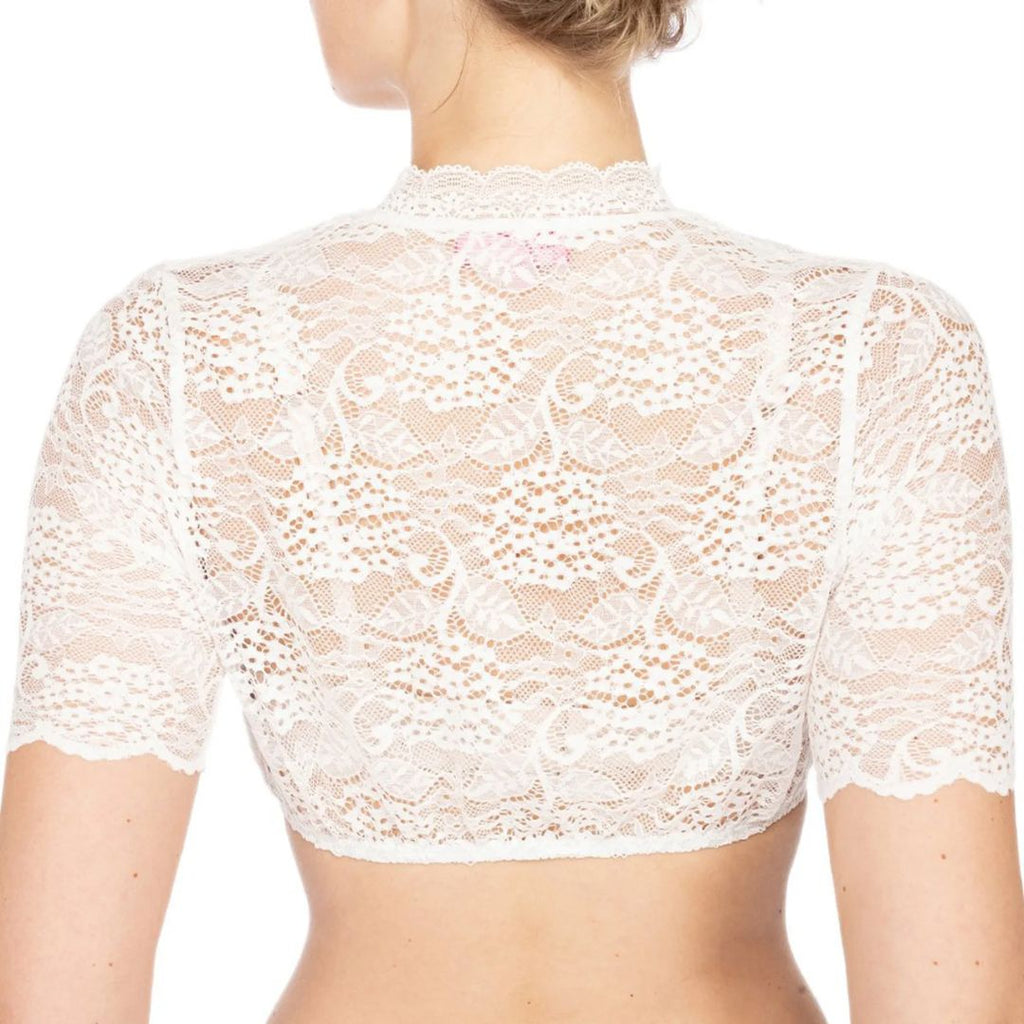 Rear view of a white cropped blouse with floral lace across the back.
