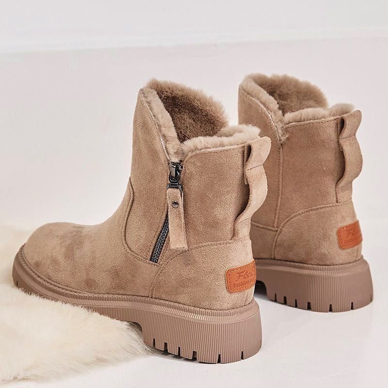 Apricot boots showing rear pull loops, side zips and heel patches.