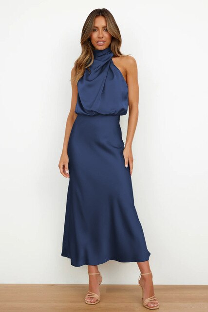 Blue sleeveless dress with a high neckline and long skirt.