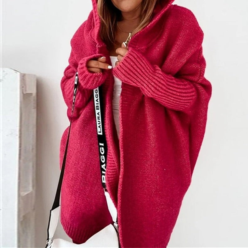 Red cardigan with a hood and ribbed cuffs.