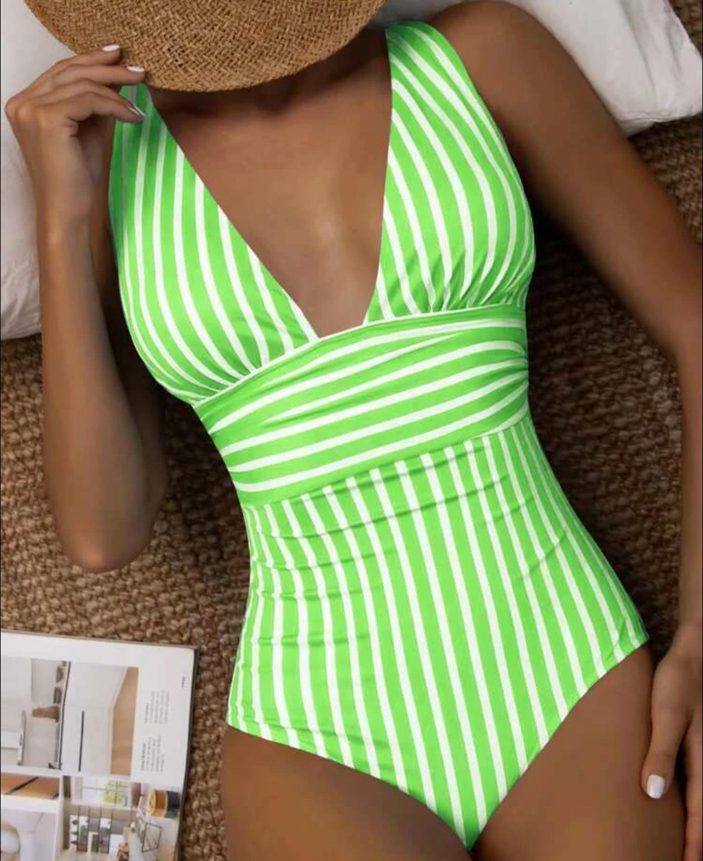 Bright green and white striped one-piece swimsuit.