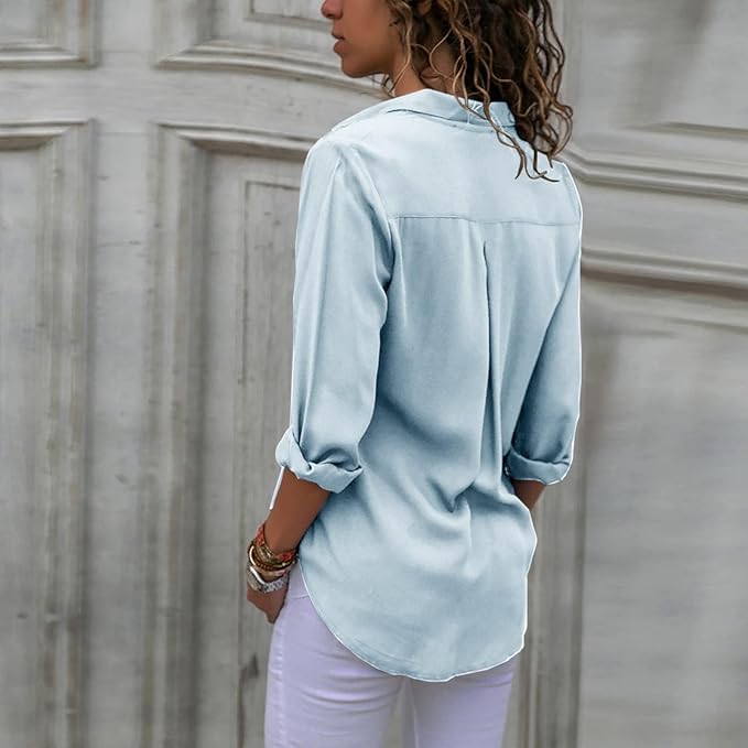Light blue blouse worn from the back.