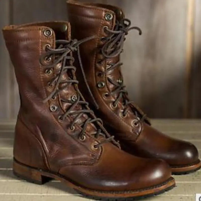 Dark brown lace-up boots with rounded toes and low heels.