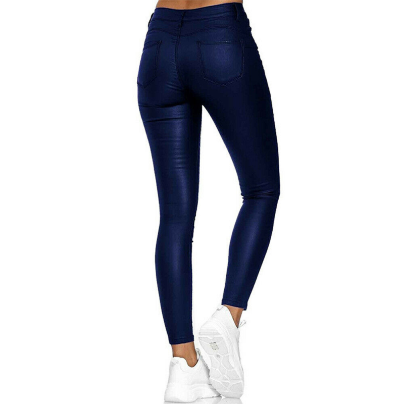 Rear view of blue jeggings showing two patch pockets.