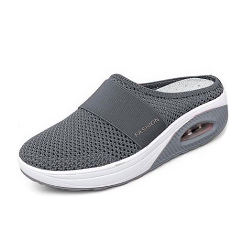 Dark grey mesh mule with a visible heel insert.