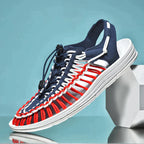 Blue, red and white cord sandal shown diagonally from above.