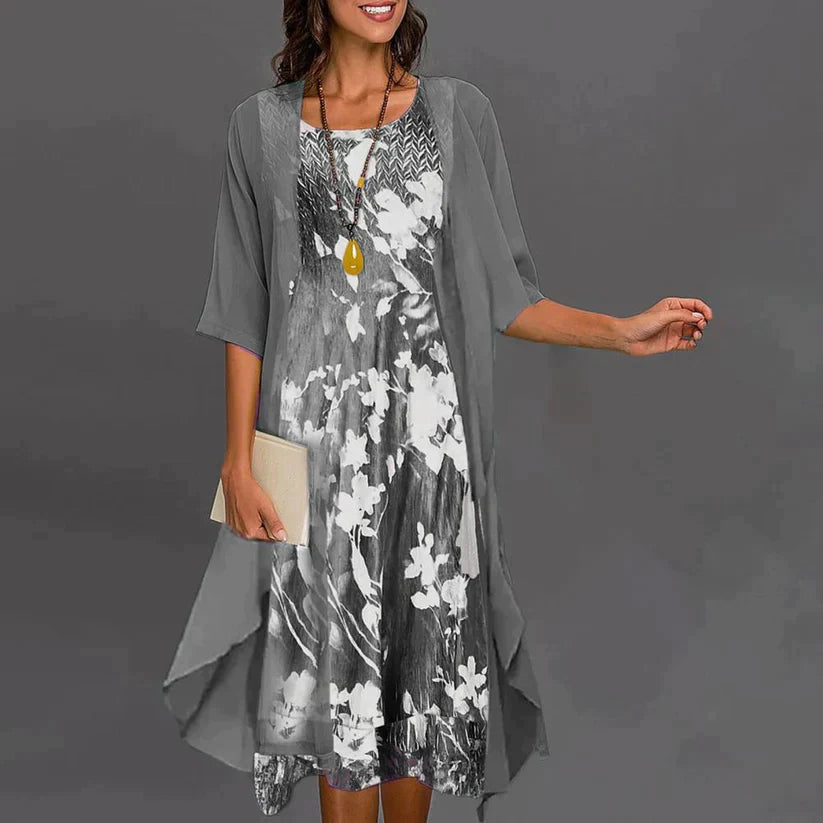 Grey floral dress with a matching open overlay.