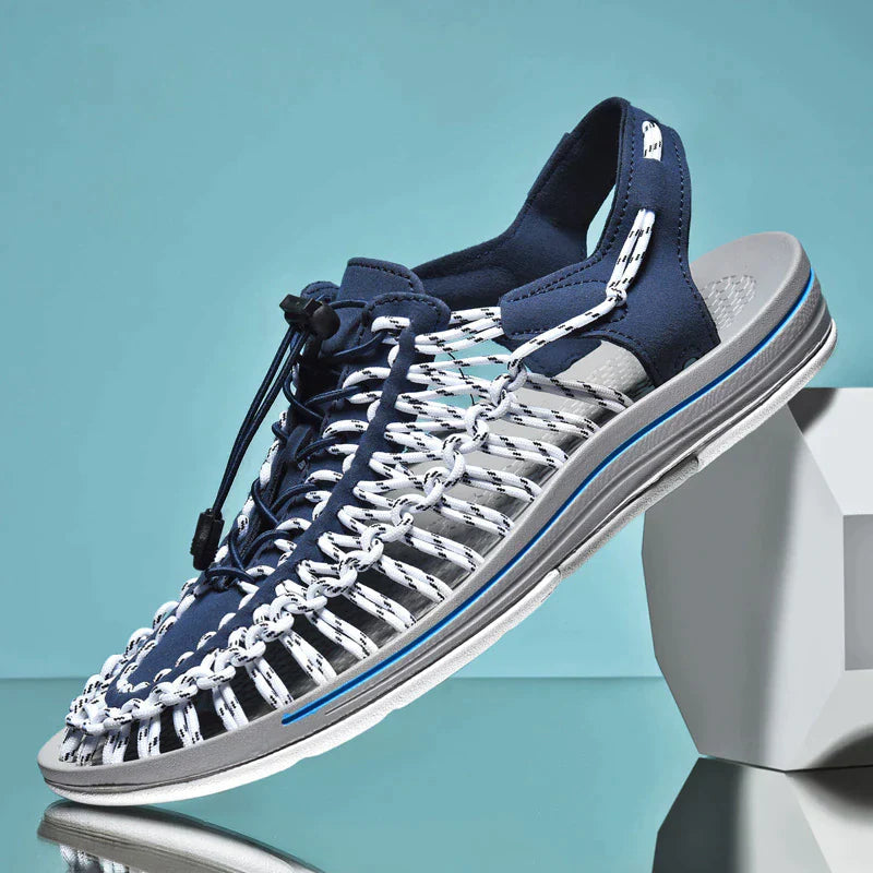 Blue and white cord sandal with an open slingback heel.