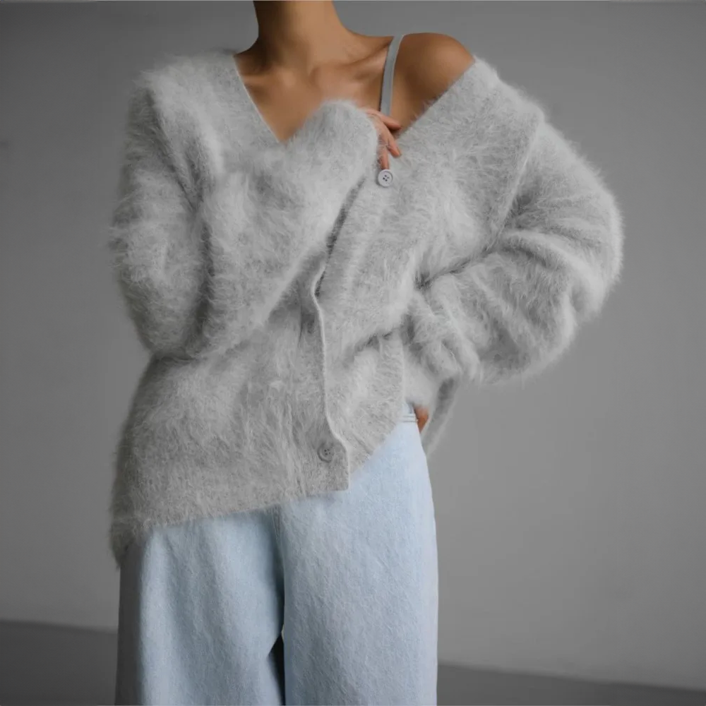 Light grey fluffy cardigan with a V neckline, shown from the front.