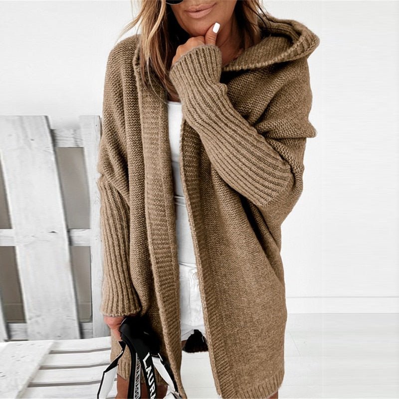 Khaki long cardigan with a hood and ribbed sleeves.