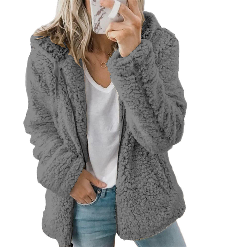 Grey teddy fleece coat shown worn open.