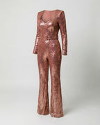 Light pink sequin jumpsuit with a curved neckline and flared hems.