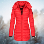 Red fitted quilted coat with long sleeves.