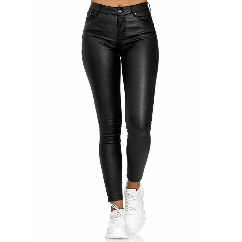 Front view of black slim-fitting jeggings with belt loops.