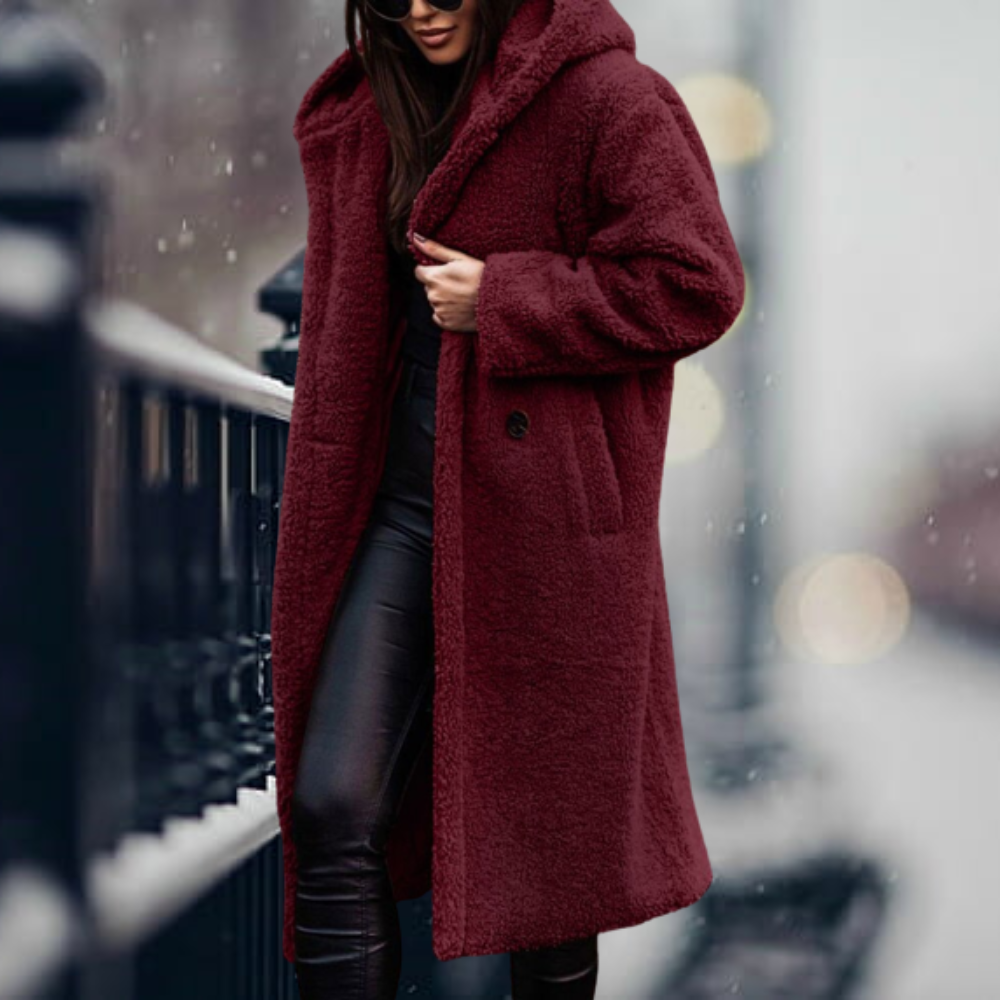 Wine red hooded coat with a fluffy texture.