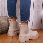 Rear view of Apricot ankle boots with elastic side panels.
