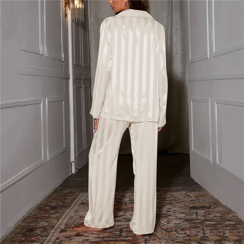 Back view of the ivory striped satin pyjama set.