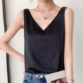 Black Trigala V-neck tank top with broad shoulder straps.
