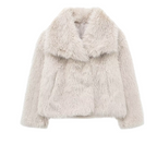 Creamy white faux-fur jacket with broad folded collar edges.