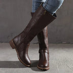 Dark brown tall boots with a side zip and rounded toes.