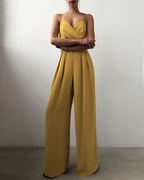 Yellow sleeveless jumpsuit with a folded bodice.