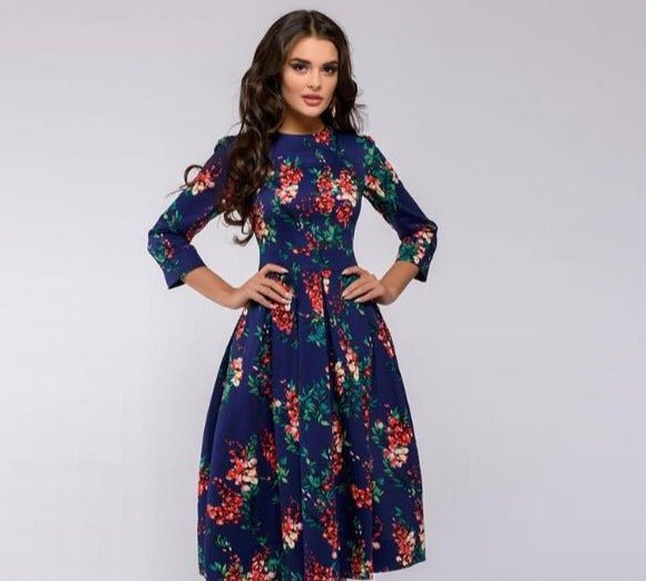 Dark-blue dress with multicoloured floral print and a full skirt.