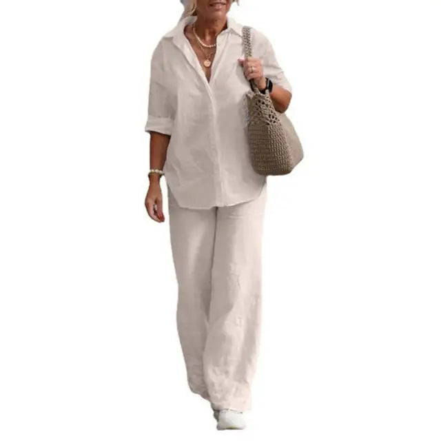 Pale cream shirt and matching loose trousers, shown against white.