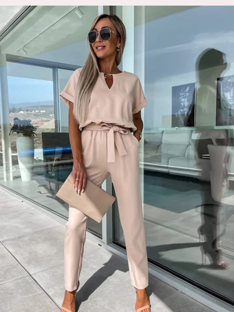 Full-length view of the khaki jumpsuit.