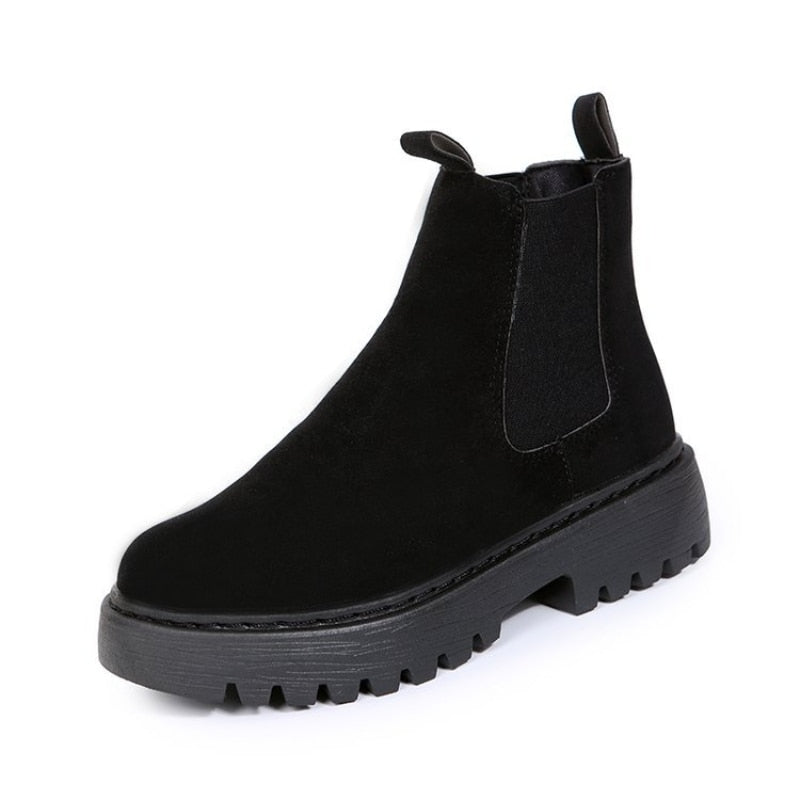 Black Chelsea ankle boot with front and rear pull tabs.
