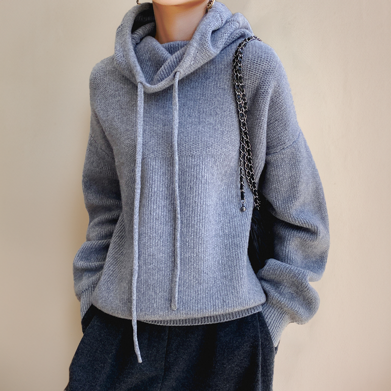 Grey knit jumper with a drawstring cowl neck.